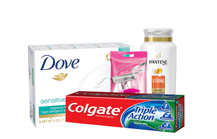 A display of toiletries, including pantene, razors, colgate toothpaste, and dove soap